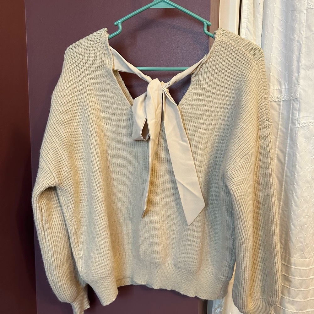 Cute sweater. NWOT. Size small